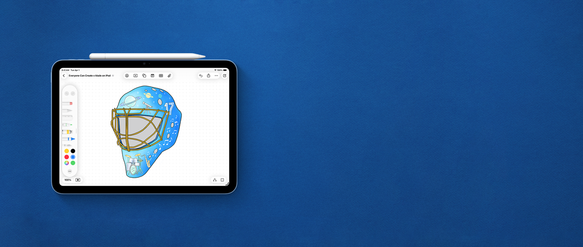 An iPad with a blue goalie mask on the screen with artwork on it.