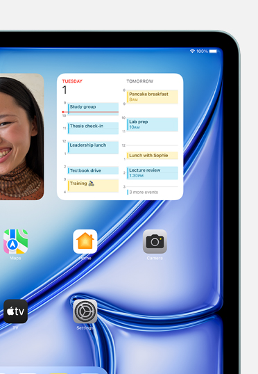 Una pantalla con varios widgets y apps, como Fotos, Calendario, Mapas, Casa, Cámara, TV y Configuración. 