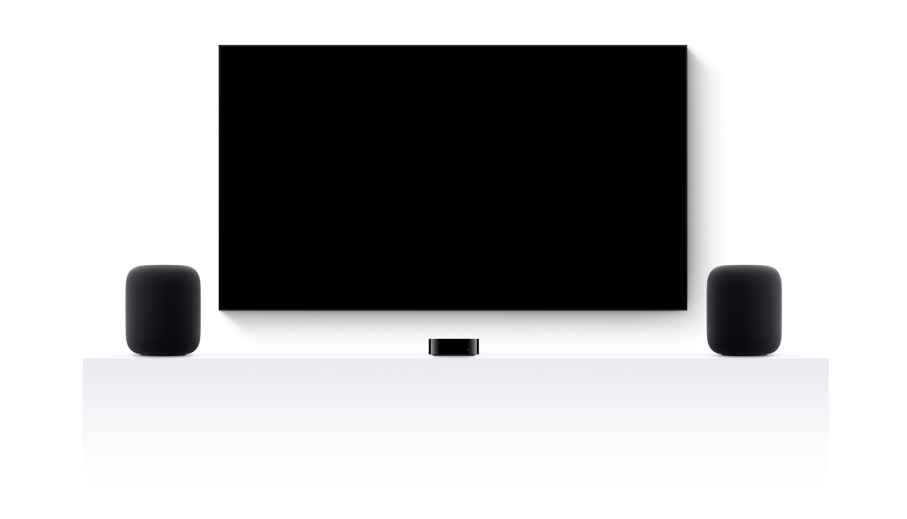 Apple TV 4k, two HomePods, and a flatscreen television showing Chief of War