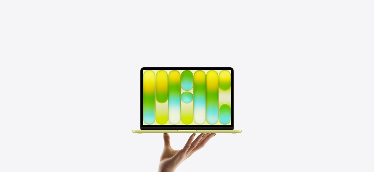 鮮亮的青橘黃色 MacBook Neo，攤開的手掌將 MacBook Neo 托舉在指尖上，螢幕轉向前方秀出色彩繽紛的抽象圖案