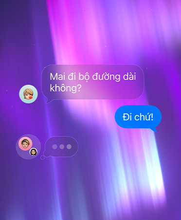 Trò chuyện nhóm trong Tin Nhắn, đặt trên nền màu hồng, tím và xanh dương